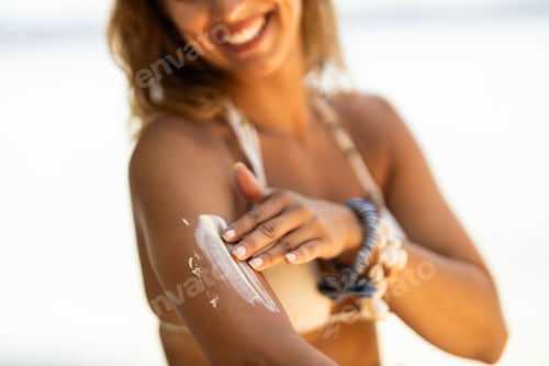 Preview: Woman Applying Sunscreen Cream