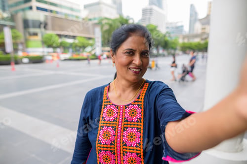Preview: Personal point view of mature Indian woman taking selfie