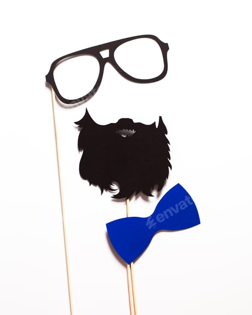 Preview: Creative photo booth props featuring glasses, a beard, and a blue bow tie for fun events and