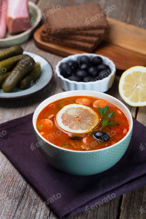 Preview: Solyanka, Russian soup with sausage, olives and capers