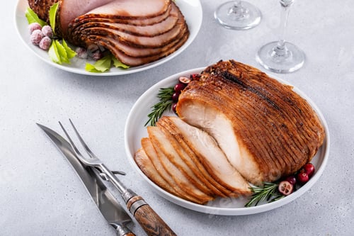 Preview: Christmas dinner main dishes, spiral sliced ham and roasted turkey breast