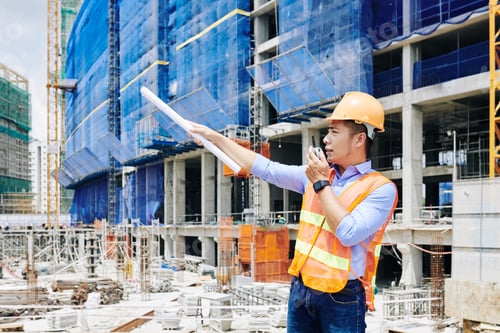 Preview: Serious civil engineer managing construction process