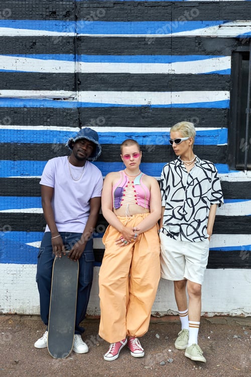 Preview: Multiethnic group of young people posing as a band in urban setting