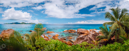 Preview: Impressive cloudscape panorama of La Digue wild rocky shore and Praslin Island on horizon