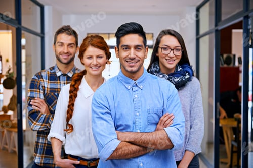 Preview: Lets show you what we can do. Portrait of a team of young designers in their modern office.