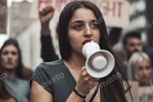 Preview: female activist in a protest march