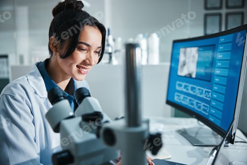 Preview: Computer screen, microscope and smile with scientist in laboratory for development, innovation or r