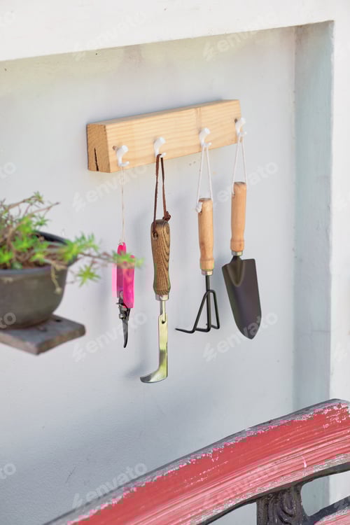Preview: Gardening tools on the wooden dock