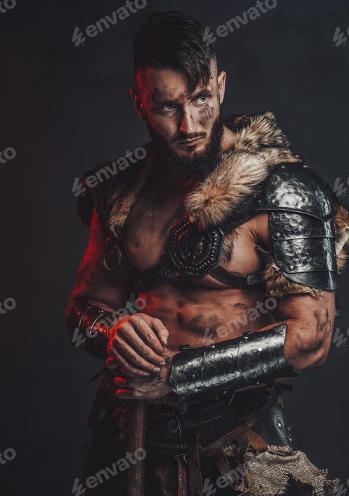 Preview: Grimy scandinavian vandal with two handed axe in dark background
