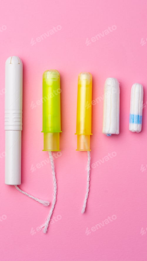 Preview: Different types of tampons shown in a row with bright backgrounds