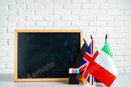Preview: Blackboard and flags of Italy, Germany and UK in a class