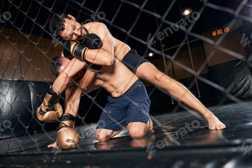 Preview: Tense fighter holding the neck of his partner