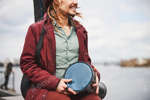 Preview: Close up of happy male looking at landscape