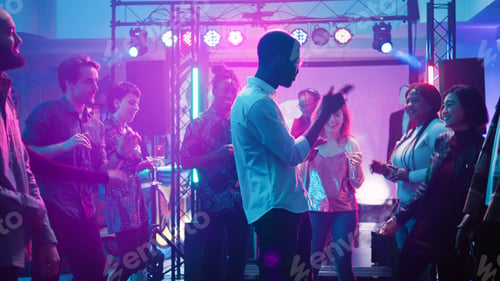 Preview: Diverse people at underground party