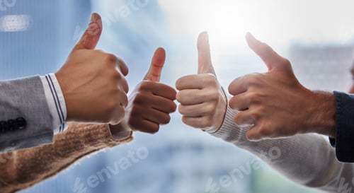 Preview: With my team at my side I am unstoppable. Shot of a group of people giving the thumbs up.