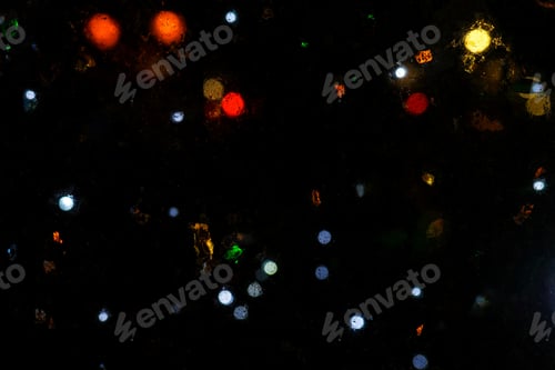 Preview: Wet the window with the background of the night city lights