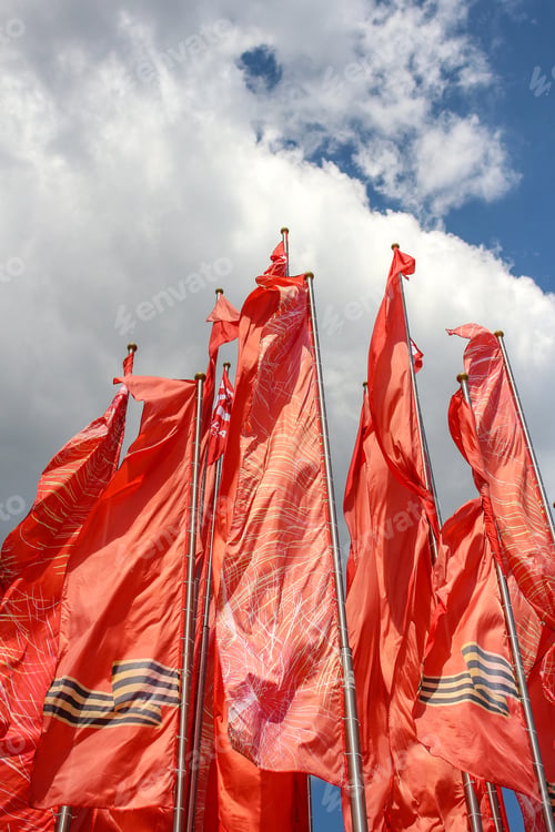 Preview: Red flags with george ribbon at Victory day in Russia