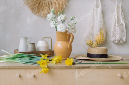 Fresh Spring Daffodils and Flowers on Wood Counter