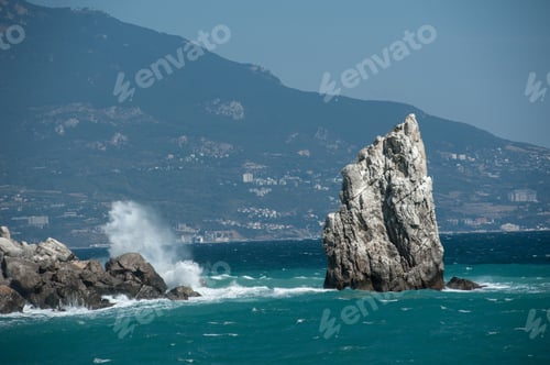 Preview: cliff in the sea during a storm