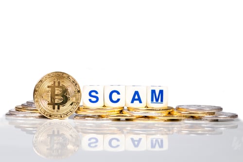 Preview: Conceptual cryptocurrency bitcoin with the word Scam