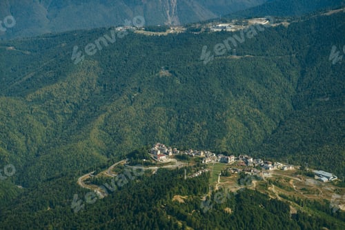 Preview: aerial view from the cable car to the Rosa Khutor resort in Sochi, Russia against Caucasus mountains