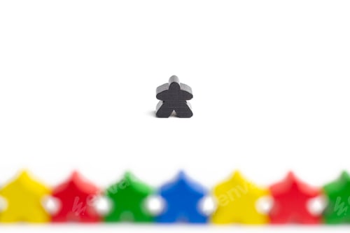 Preview: One against many concept. Follow only your thought. A black figure in front of many colourful