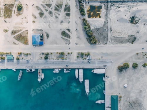 Preview: the aerial view of boats docked at a marina on the water