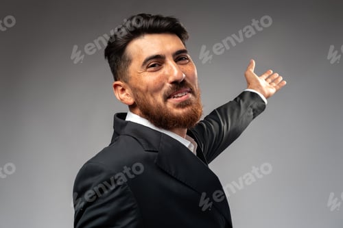 Preview: Portrait of handsome confident business on gray background