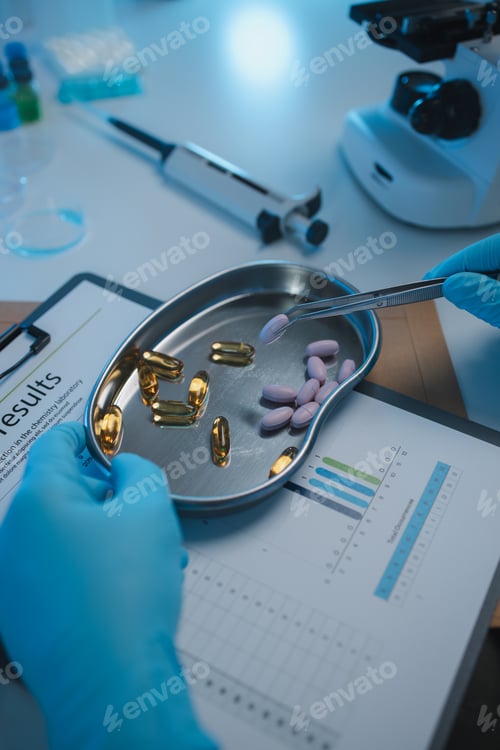 Preview: a scientist is testing various pills in order to improve their quality an effectiveness in the labor