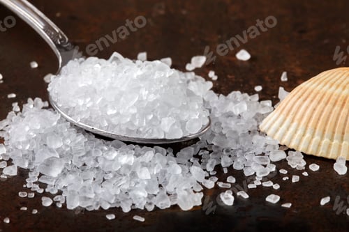 Preview: Close up of sea salt in stainless steel spoon