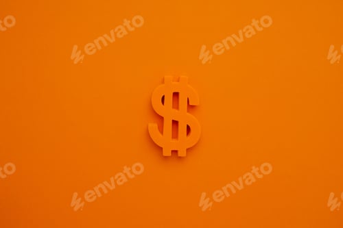 Preview: American dollar symbol on orange background macro view