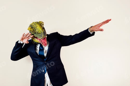 Preview: Man with a lizard head in studio.