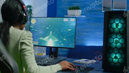 Preview: Addicted african video gamer performing cyber video games