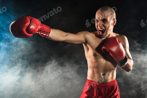 Preview: The young man kickboxing in blue smoke