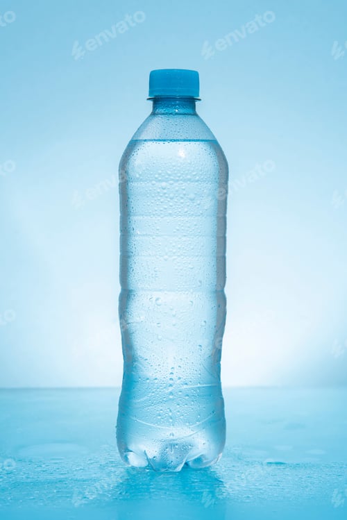 Preview: Plastic bottle with frosted lid filled with water on wet reflect