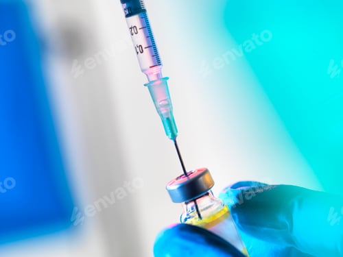 Preview: Syringe inserted into a vaccine vial
