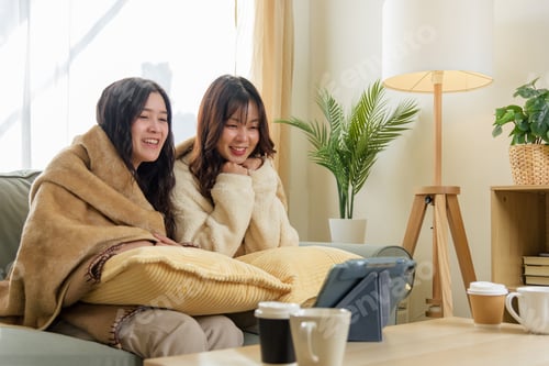 Preview: Winter day creates warm atmosphere for friends at home, fostering close friendship, women happily