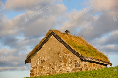 Preview: Traditional stone house with turf roof in Faroe islands. Denmark