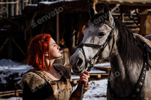 Preview: Red-haired woman with a faithful horse preparing for battle