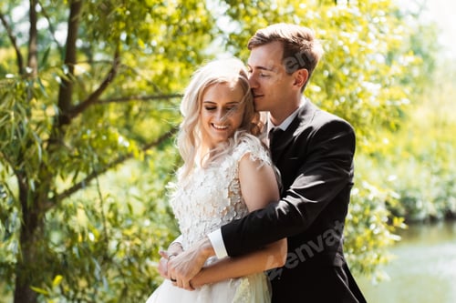 Preview: Bride and groom at wedding day walking outdoors. Bridal couple happy newlywed woman and man walk