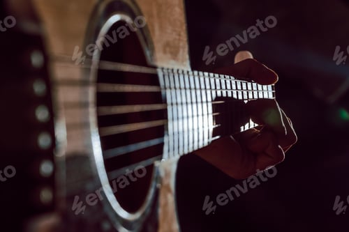 Preview: Boy plays the guitar.