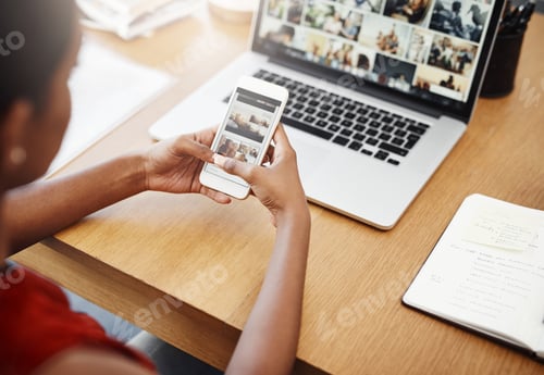 Preview: Cropped shot of an unrecognizable businesswoman using a cellphone in her home office
