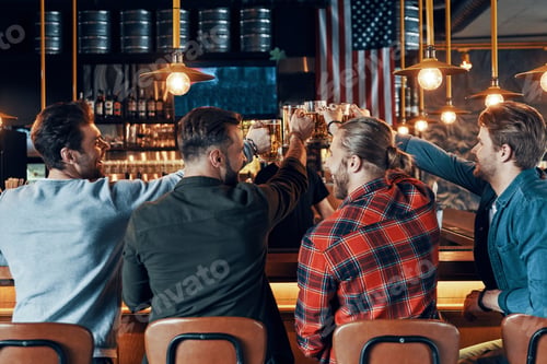 Preview: Rear view of happy young men in casual clothing