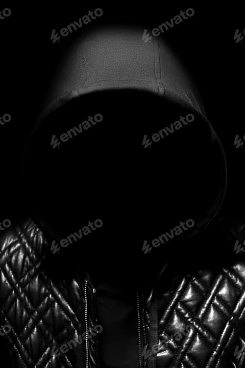 Preview: Art portrait of a hooded man with big rhinestones on his face. Mysterious mystical appearance of a