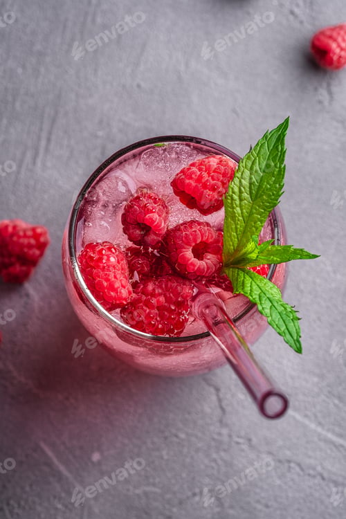Preview: Fresh ice cold berry juice drink with mint