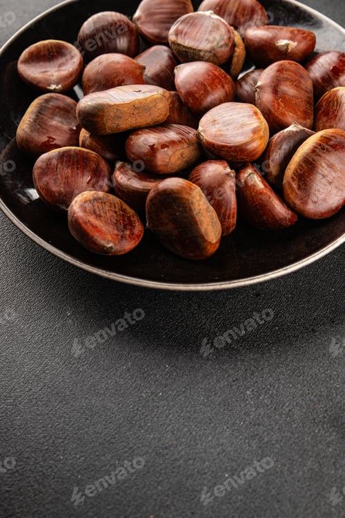 Preview: Edible chestnuts delicious treat tasty snack fresh gourmet food background on table rustic food