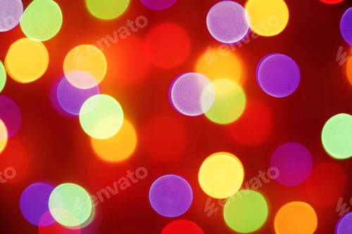 Preview: Colorful holiday bokeh blur light. Abstract Christmas or New Year background.