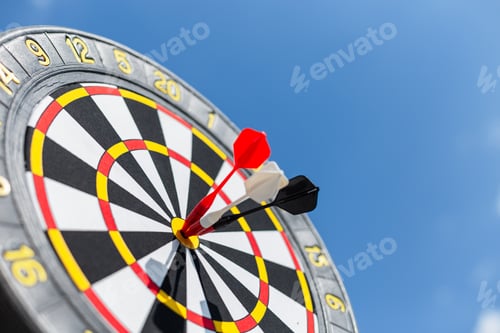Preview: Three darts hitting the target on a blue sky background, concept. Marketing and successful targeting