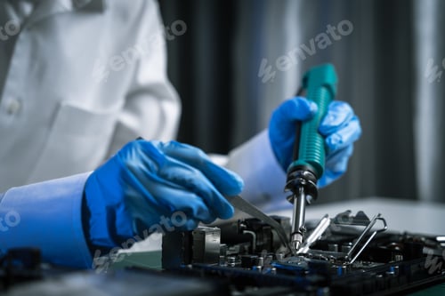 Preview: killed hands repairing electronic devices with precision. technology repair