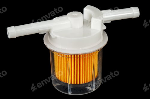 Preview: Car fuel filter, isolated on black background